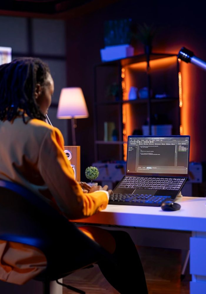 technician-home-office-typing-code-notebook-device_482257-116249